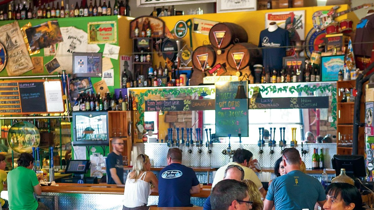 A crowd of people enjoying beers at Dunedin Brewery