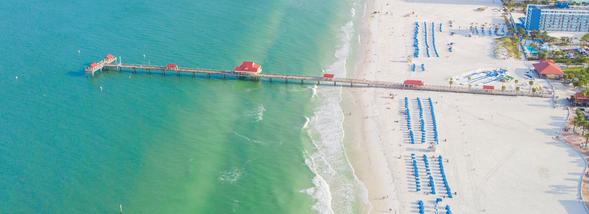 Aerial view of Pier 60 and blue cabanas in Clearwater Beach