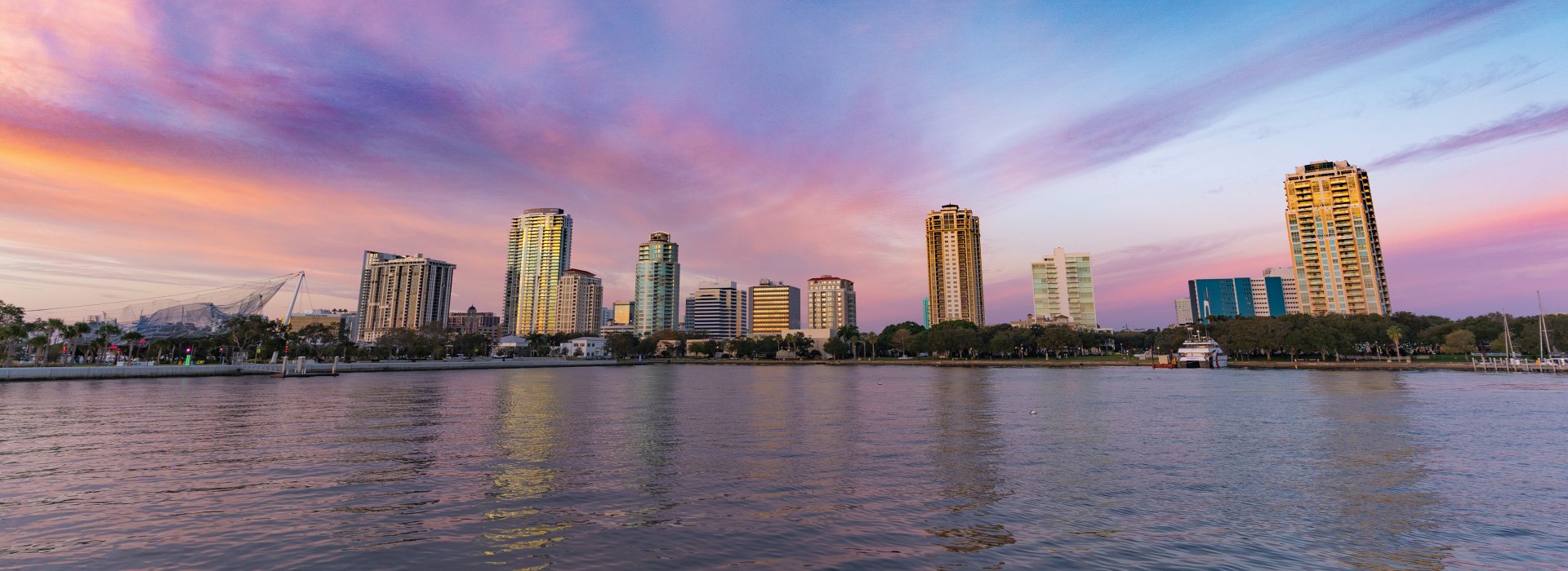 Blue and purple sunrise sky of St. Pete downtown skyline.