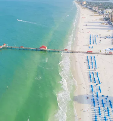 Aerial view of Pier 60 and blue cabanas in Clearwater Beach
