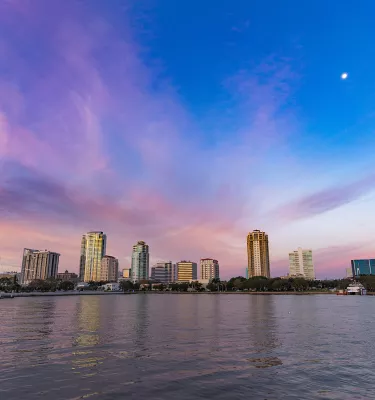 Blue and purple sunrise sky of St. Pete downtown skyline.