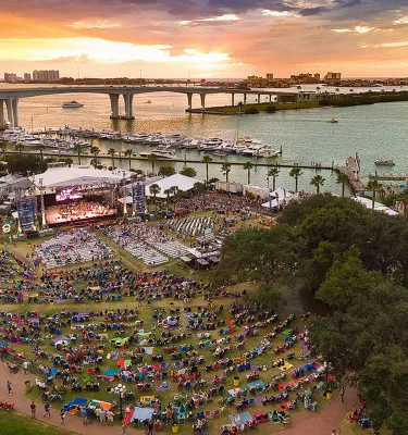 Clearwater Jazz Festival overview of crowd and bridge at Coachman Park during sunset