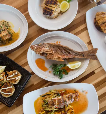 a fish plate and several other dishes