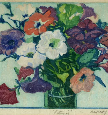 A wood block print featuring a vase full of purple, white, red and yellow petunias.
