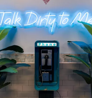 Image of the secret payphone entrance at Dirty Laundry in St. Pete to enter their special speakeasy lounge.