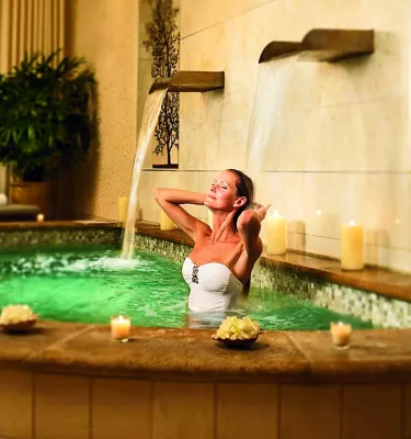 Woman relaxing in a spa jacuzzi