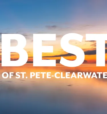 a dramatic sunrise over the St. Pete Pier; the image has the words "Best of St. Pete-Clearwater" on top