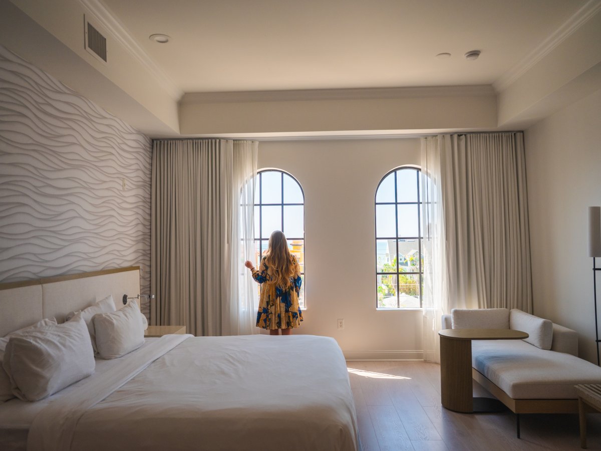 A woman in a Hotel Zamora Room