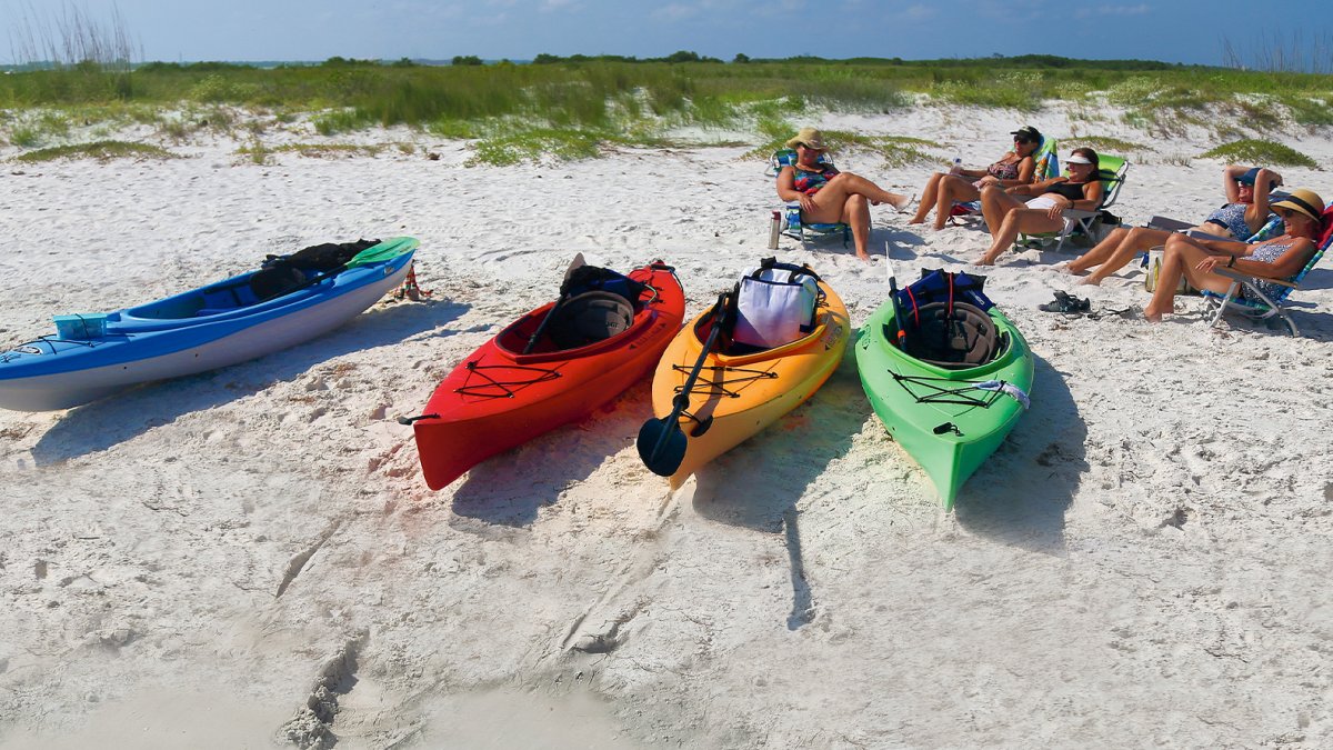 Kayakers taking a break in Caladesi Island.