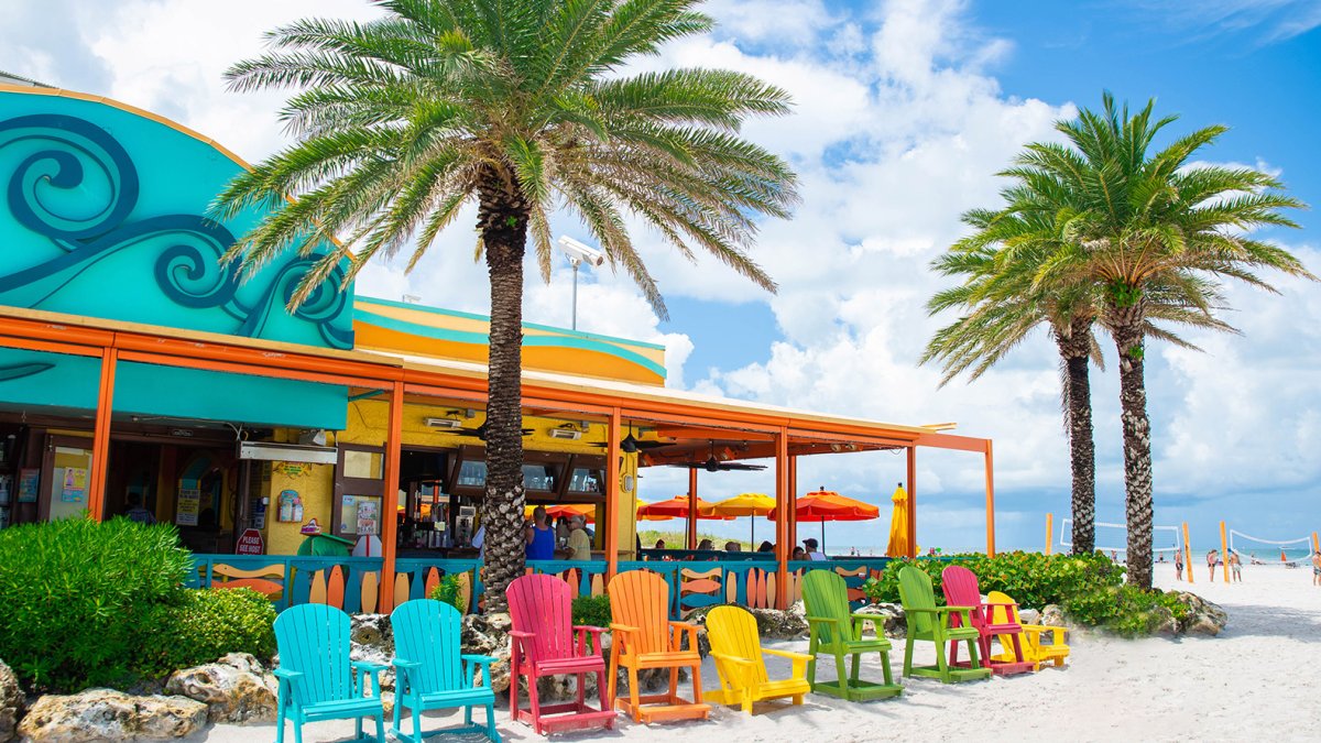 Colorful lawn chairs outside of Frenchy's beachfront restaurant