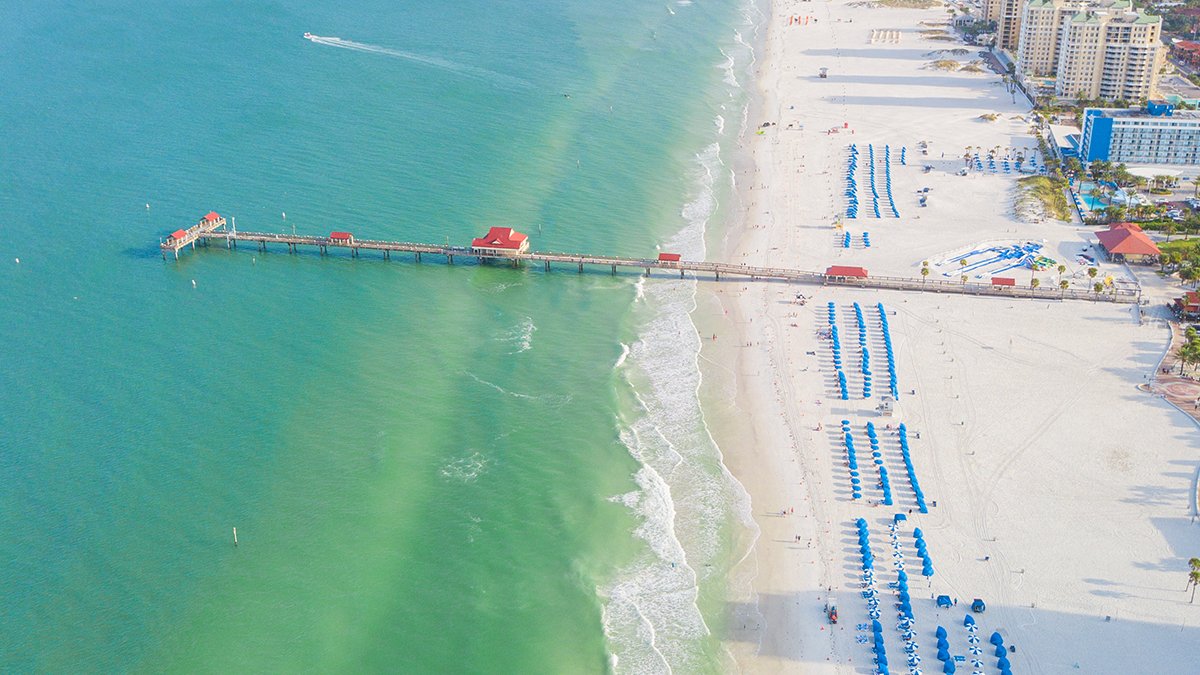 Aerial view of Pier 60 and blue cabanas in Clearwater Beach