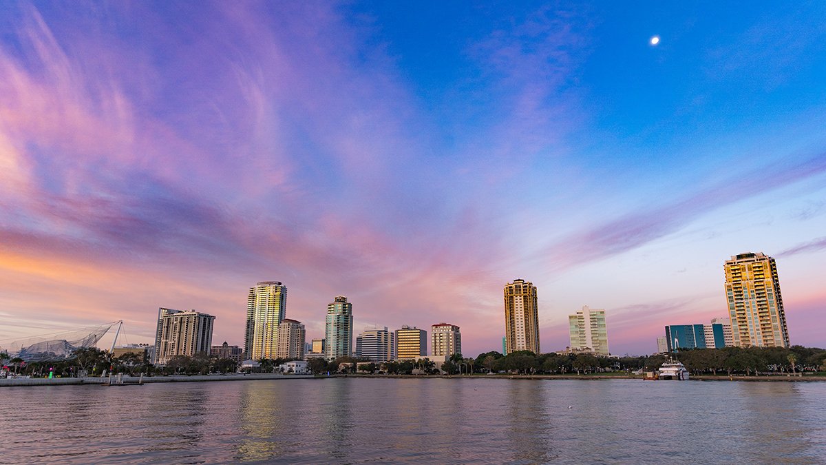 Blue and purple sunrise sky of St. Pete downtown skyline.