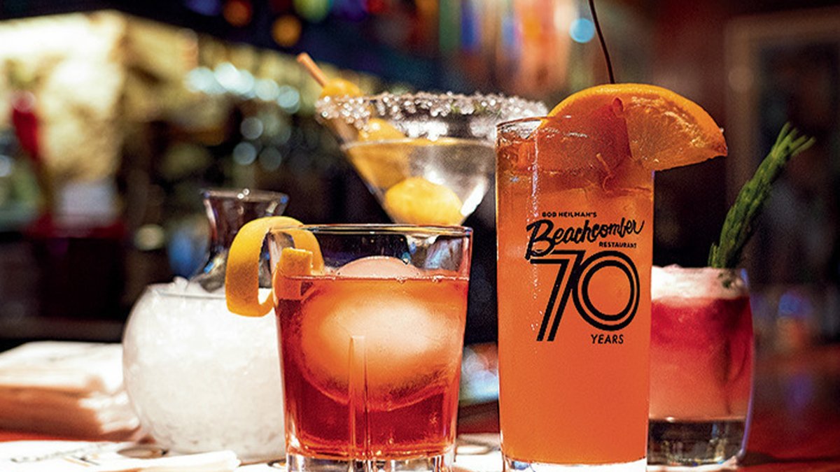 A set of cocktails with oranges on their rims from Beachcomber bar in Clearwater.