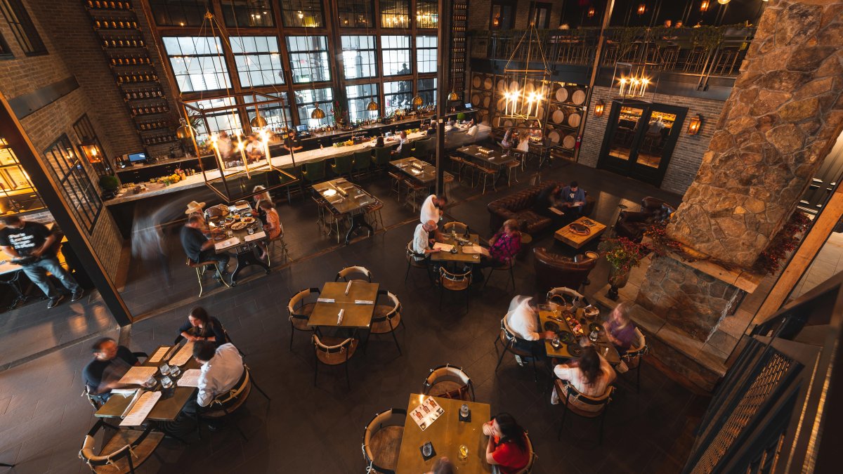 Arial View of a Stillhouse with dining area. Wood accents and brick and rock walls