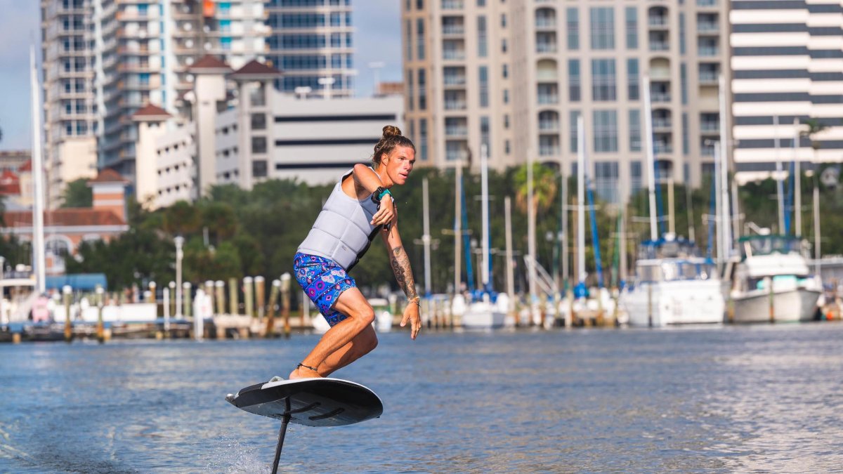 Person on an E-foil board in Tampa Bay