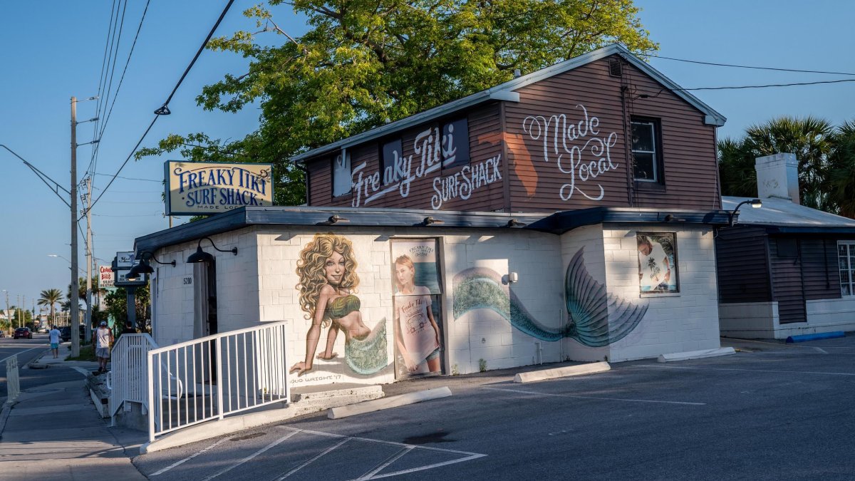 the exterior of the Freaky Tiki surf shop in St. Pete Beach with a mermaid painted on the side