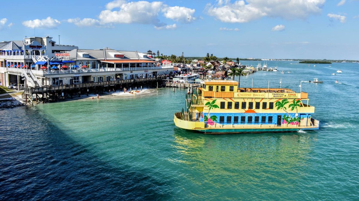 Calypso Breeze preparing to dock at John's Pass Village & Boardwalk on Madeira Beach.