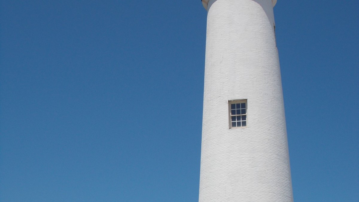 The white-painted working lighthouse at Egmont Key state park