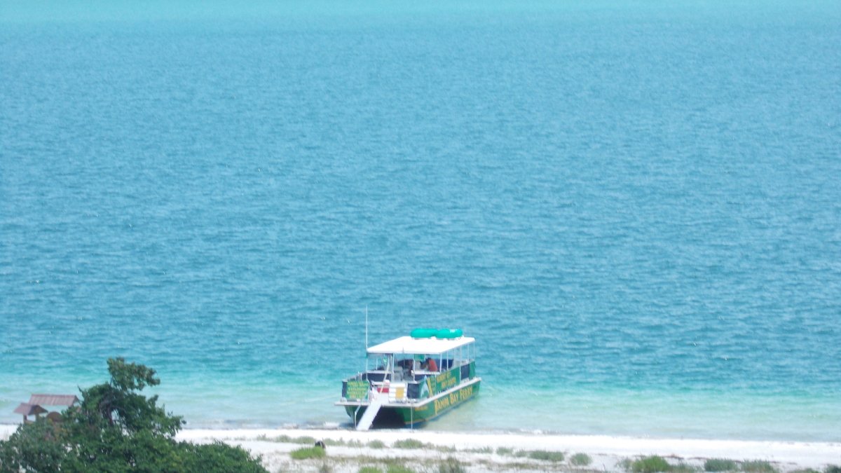 Our Tampa bay Ferry on the beach waiting for our guests to return after exploring the island