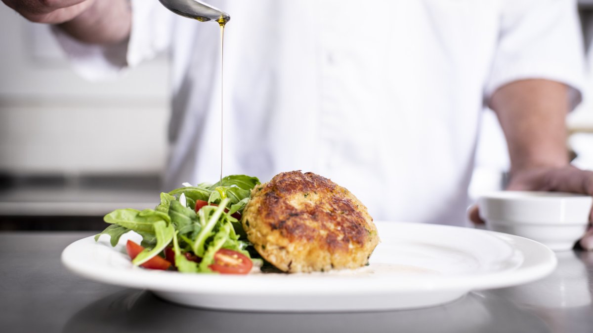 Blue Crab Cake with Old Bay remoulade, arugula and fennel salad