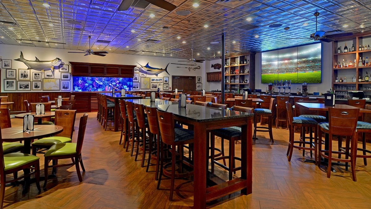 Indoor Bar with Predator Tank and Large Flat Screen TV